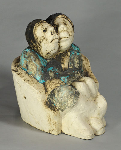 Zittend paar in stoel